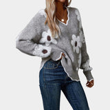 Klára – jersey con cuello de pico y motivo floral