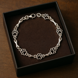 Aurembiaix™ | Pulsera de Dijes Huella y Hueso en Plata