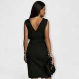 Desi - Vestido con cuello de pico y abertura
