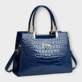Cécile. - Bolso brillante con estampado de cocodrilo