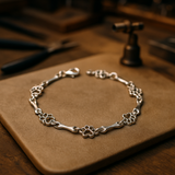 Aurembiaix™ | Pulsera de Dijes Huella y Hueso en Plata
