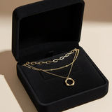 Collar de oro con colgante doble