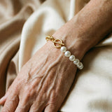 Victoria - Elegante pulsera de oro con perlas