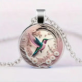 Lunéa™ | Collar con colgante de colibrí bajo cúpula de cristal