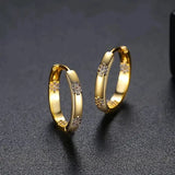 Pendientes de oro con diseño floral