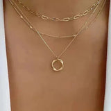 Collar de oro con colgante doble